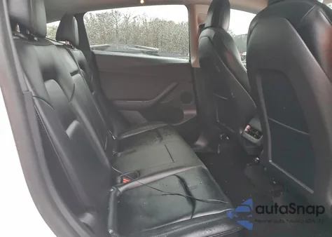 2022 Tesla Model Y from USA, damaged, VIN 7SAYGDEF2NF387620